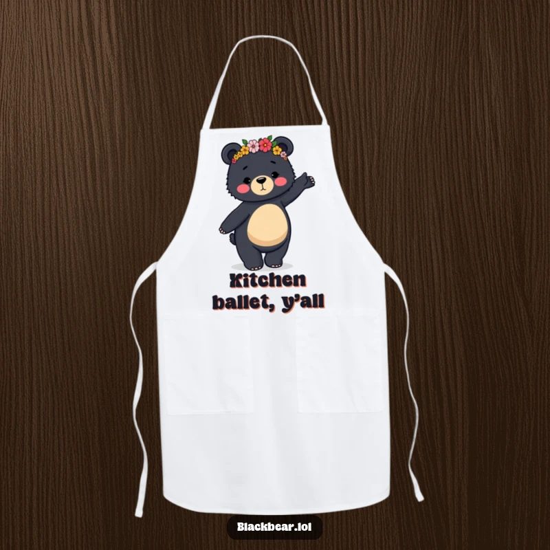 Funny apron showing a black bear in a flower crown doing a clumsy, graceful dance, bringing humor to cooking.