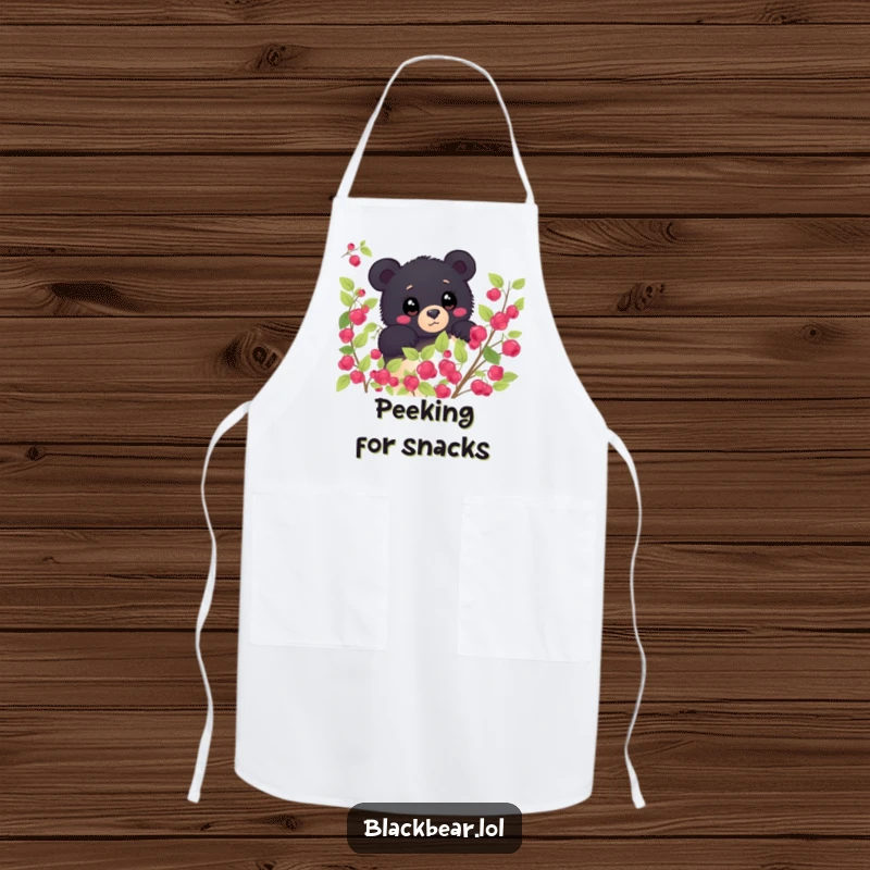 Funny shy black bear peeking from behind a berry bush, eyes wide with wonder on a kitchen apron. Curious and humorous forest animal accessory.