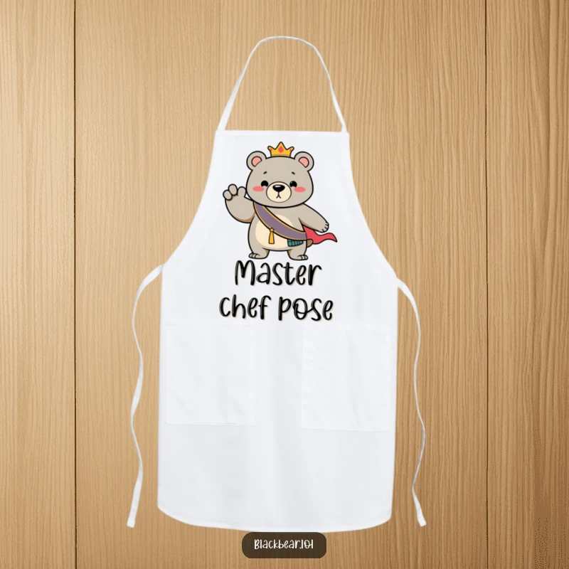 Funny Apron: Bear with a regal sash, striking a dramatic pose, perfect for the kitchen diva.