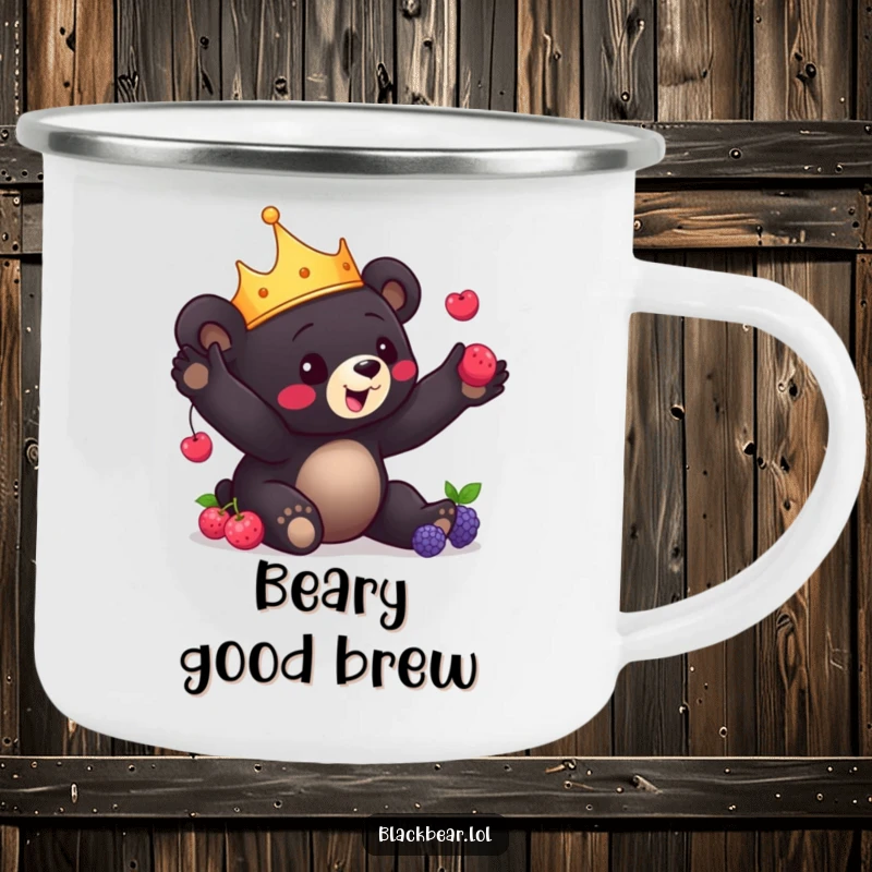 Funny Bear Cub Camping Mug: Charming black bear cub with a crown playfully juggles berries, perfect for enjoying drinks outdoors.