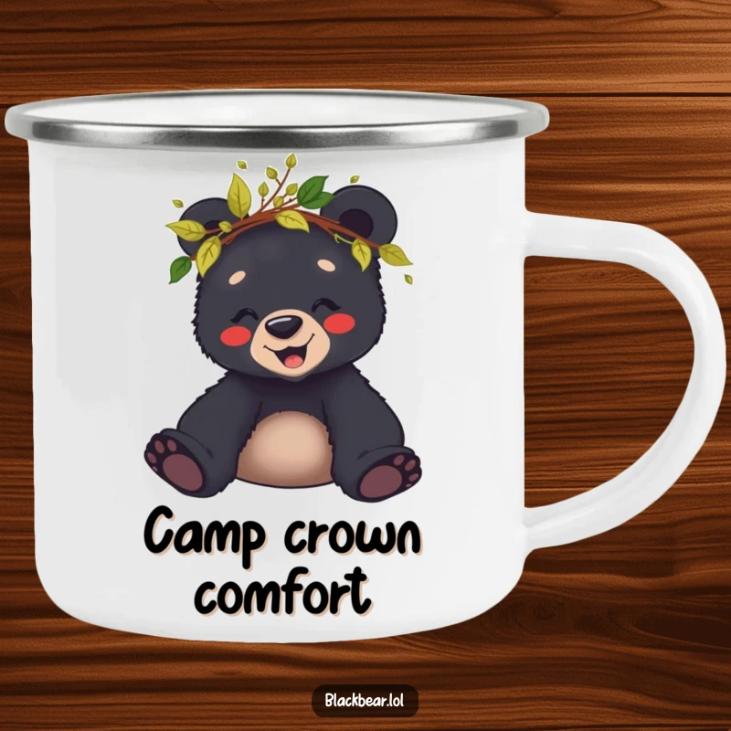 Funny camping mug with a giggling black bear cub wearing a crown of leaves and twigs, ready for outdoor fun.