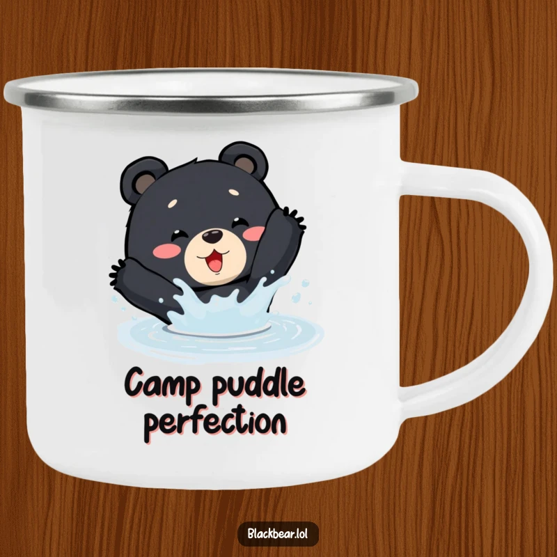 Funny Camping Mug: A black bear happily splashes in a puddle, ready for outdoor adventures.