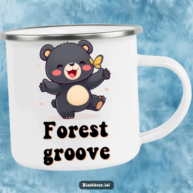Funny camping mug with a black bear cub dancing playfully with a butterfly, ready for outdoor escapades.