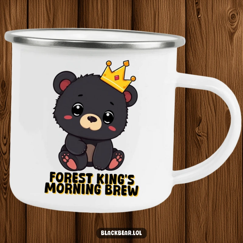 Funny camping mug with a black bear cub wearing a tiny crown and looking surprised, ideal for outdoor drinks with regal humor.