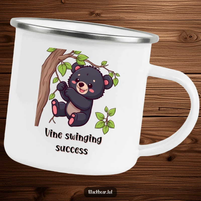 Funny black bear cub camping mug with a cub playfully tugging on a vine, ready for wilderness fun.