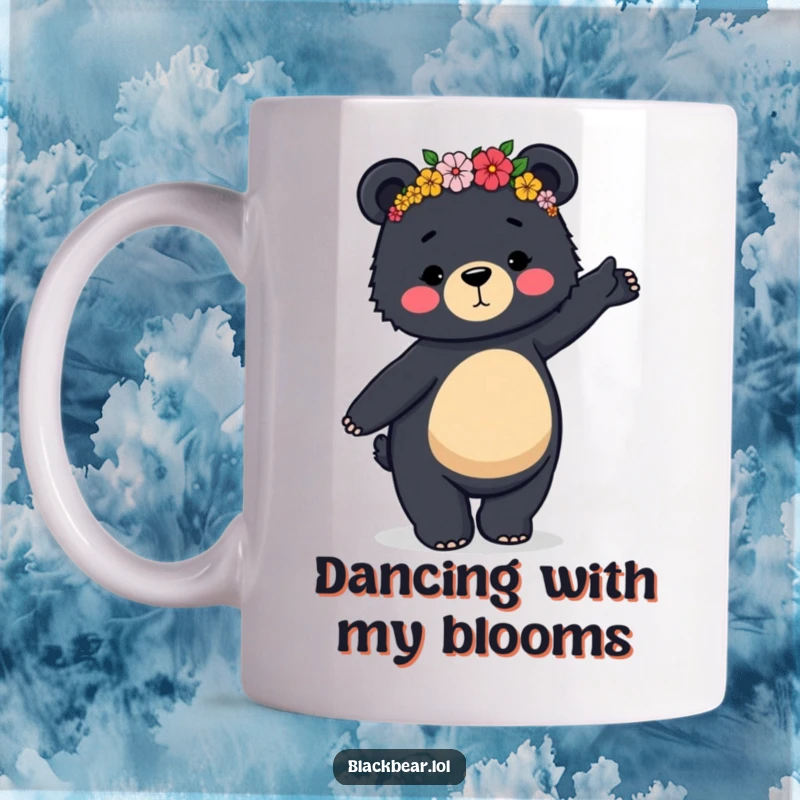 Funny mug showing a black bear wearing a flower crown, attempting a clumsy yet graceful dance with a happy expression.