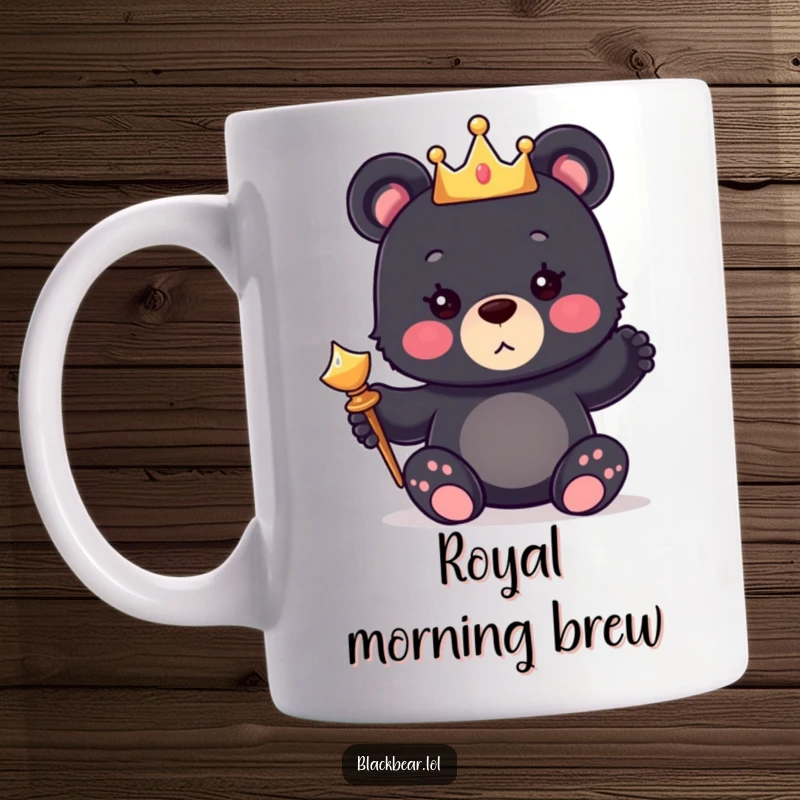 Funny mug featuring a cute black bear cub wearing a tiny crown and holding a shiny scepter, looking regal.