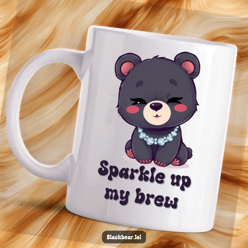 Funny mug features a cute black bear cub winking playfully while sporting a dazzling, glittery necklace.