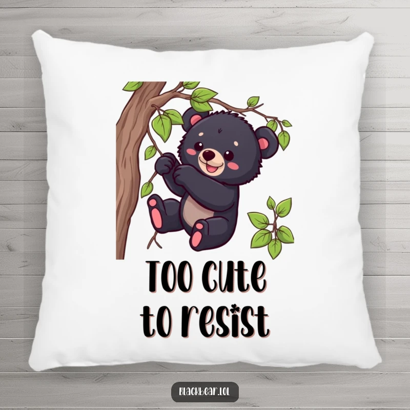 Funny black bear cub pillow featuring a playful cub tugging on a vine, adding cute and cuddly humor.