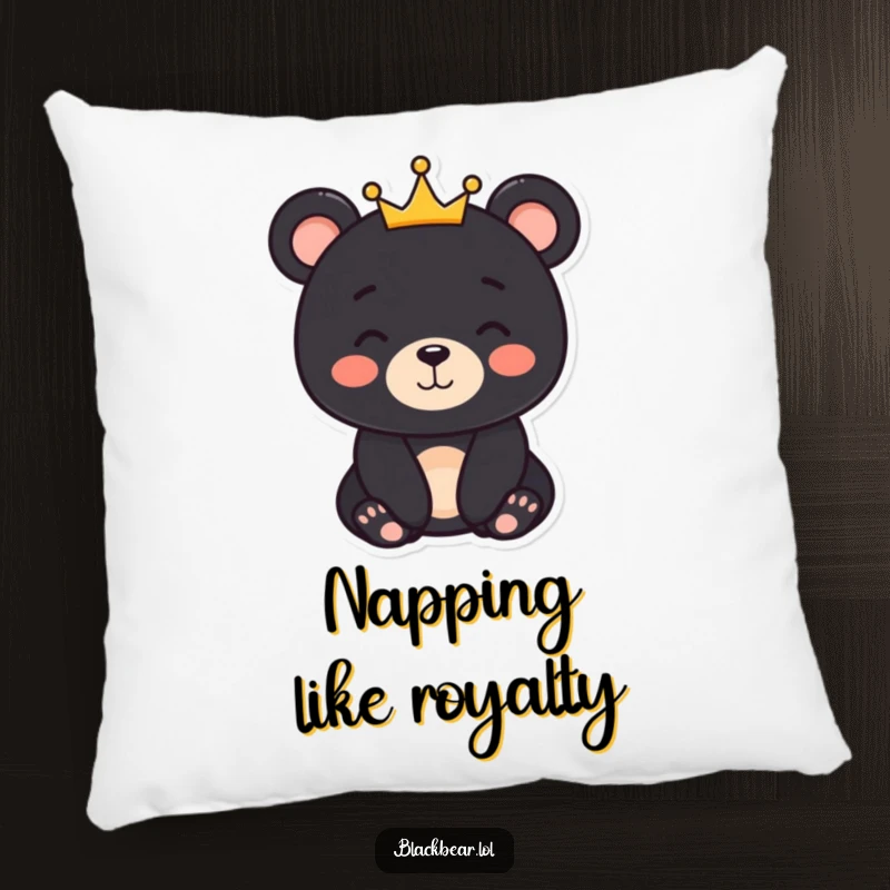 Funny black bear character with a gentle smile and a small crown, depicted on a soft pillow for cozy, royal decor.