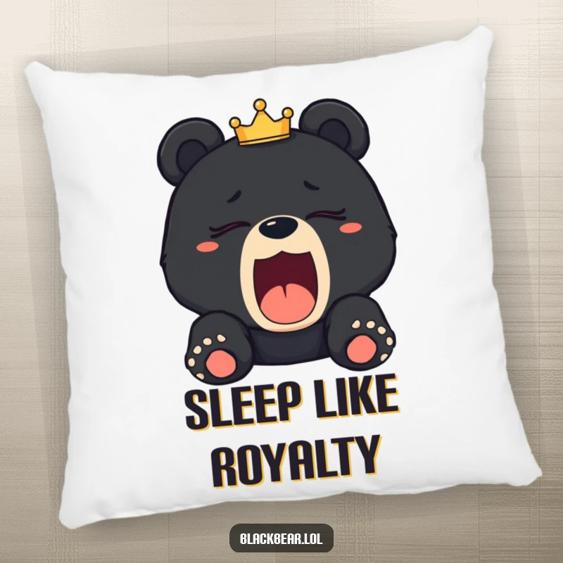 Funny sleepy black bear cub pillow showing a cub yawning with a tilted crown, offering comfort and humorous regal charm.