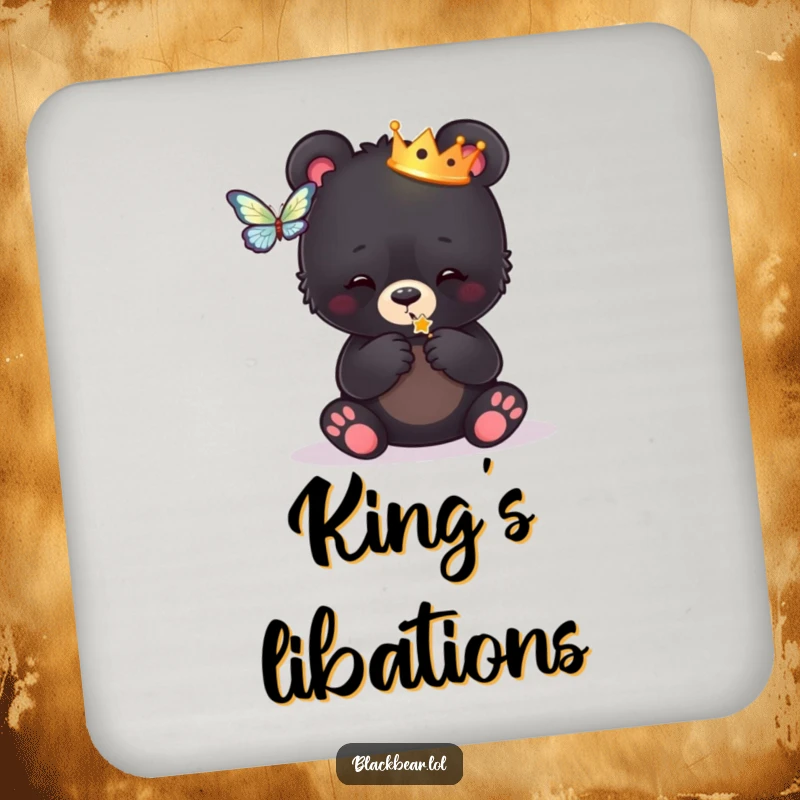 Funny coasters depicting a black bear cub in a crown, playfully reaching for a butterfly, adding regal flair to tabletops.