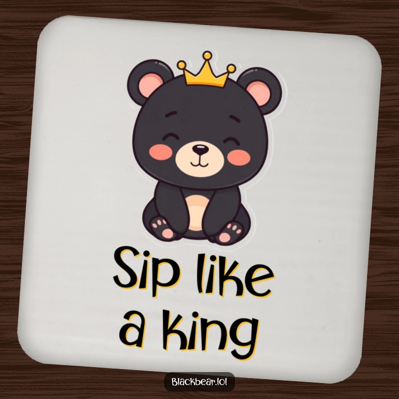 Funny black bear character with a gentle smile and a small crown, printed on a drink coaster, offering protection and gentle humor.