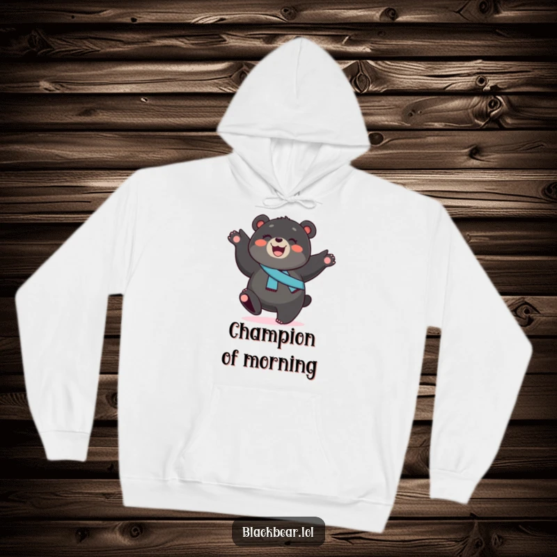 Funny black bear cub hoodie, a smiling cub with a sash, performing a cartwheel, offering cozy comfort and energetic humor.