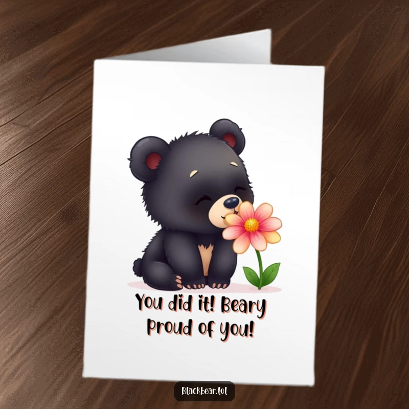 Funny Free Printable Congratulations Card: Curious young black bear cub sniffing a vividly colored flower with pure fascination.