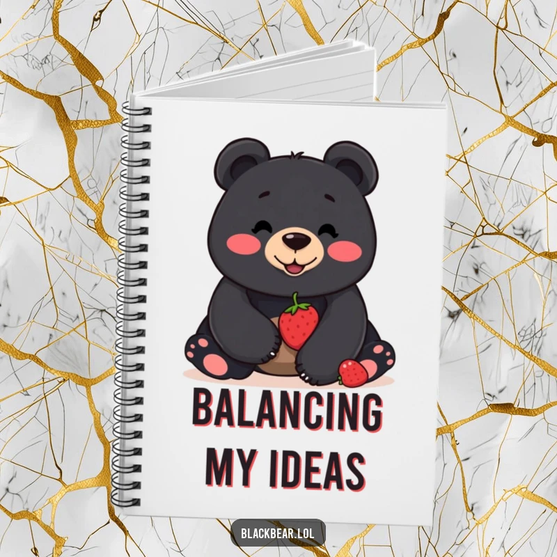 Funny notebook with a smiling black bear balancing a berry on its nose, perfect for jotting down ideas with focus and flair.
