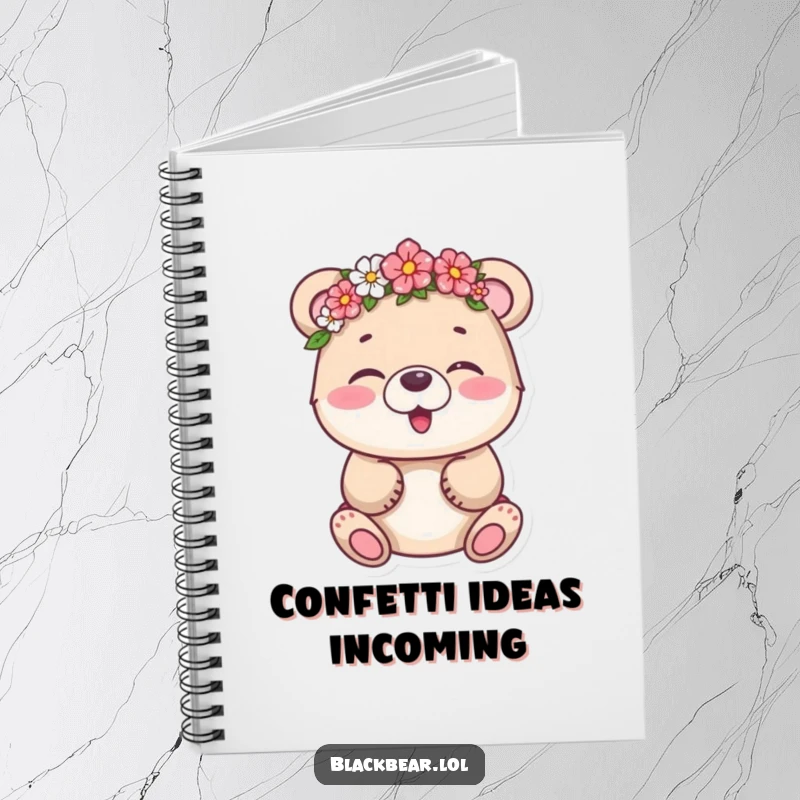 Funny bear cub giggling sweetly while wearing a flower crown, featured on a notebook cover for writing inspiration.
