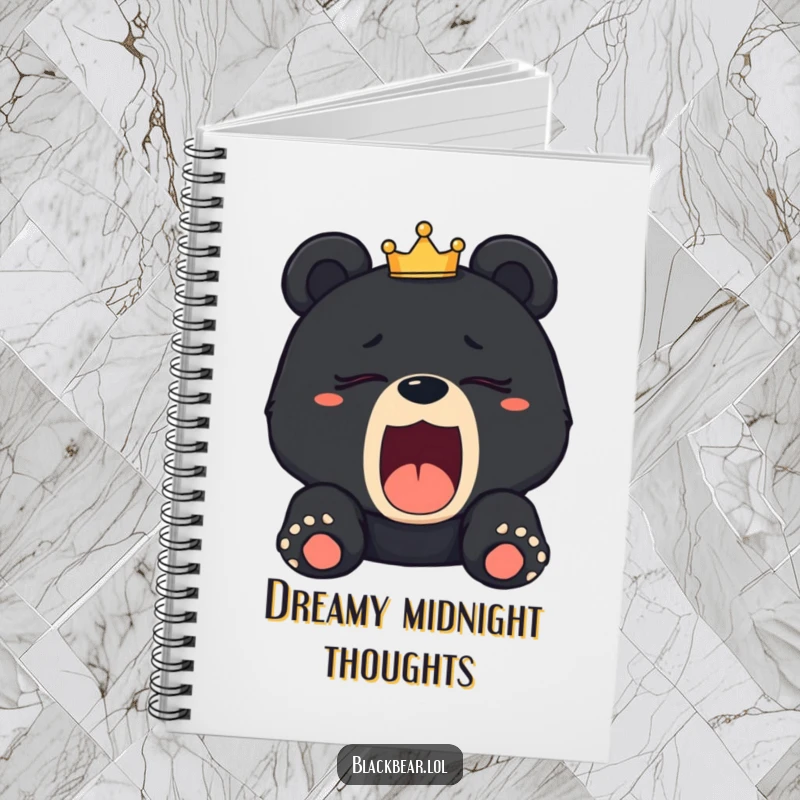 Funny sleepy black bear cub notebook with a cub yawning and a tilted crown, perfect for journaling and royal plans.