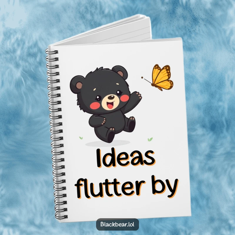 Funny notebook with a happy black bear cub chasing a butterfly, perfect for journaling joyful thoughts and creative ideas.