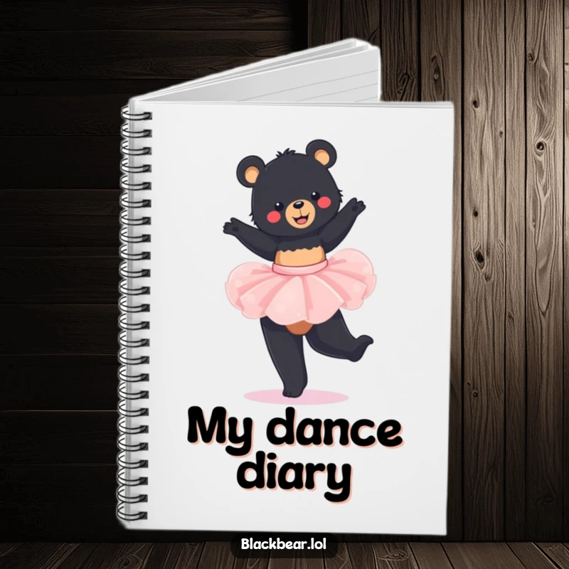 Funny Notebook: Young black bear in a tutu, joyfully twirling, with blank lined pages inside for notes.