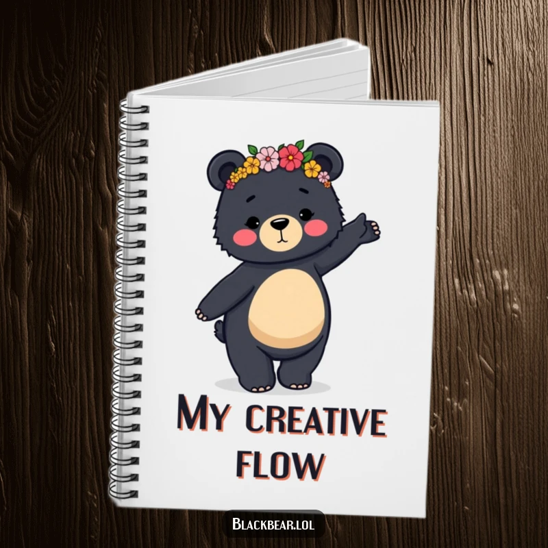 Funny notebook featuring a black bear in a flower crown doing a clumsy, graceful dance, ideal for note-taking with charm.