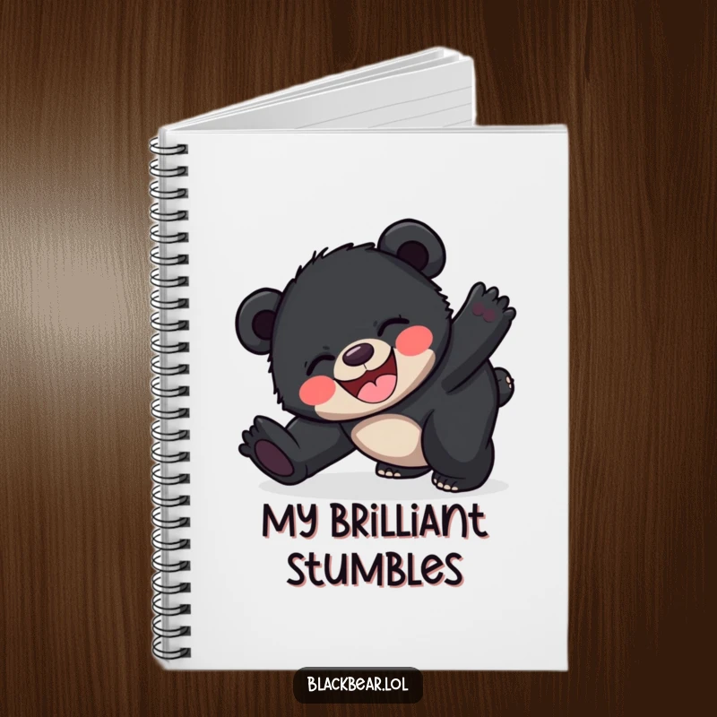 Funny happy black bear cub notebook showing a cub joyfully tripping, perfect for note-taking and creative brainstorming.