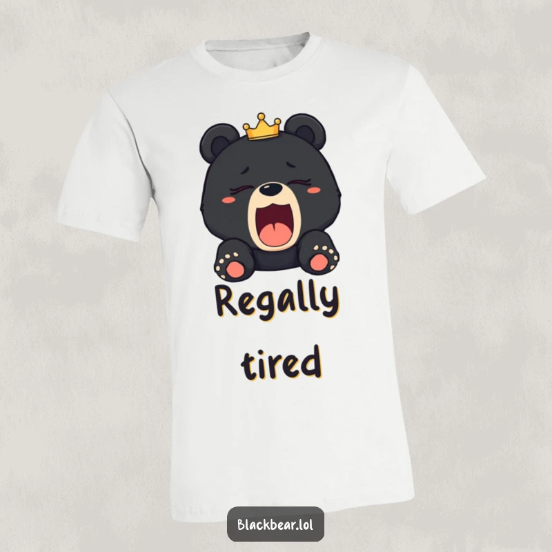 Funny sleepy black bear cub t-shirt yawning widely, with a crooked crown, conveying regal exhaustion and a need for rest.