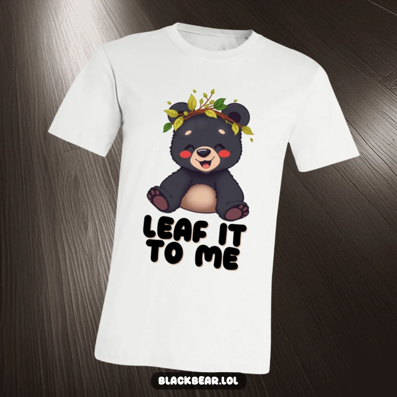Funny t-shirt depicting a giggling black bear cub crowned with leaves and twigs, radiating pure woodland joy.