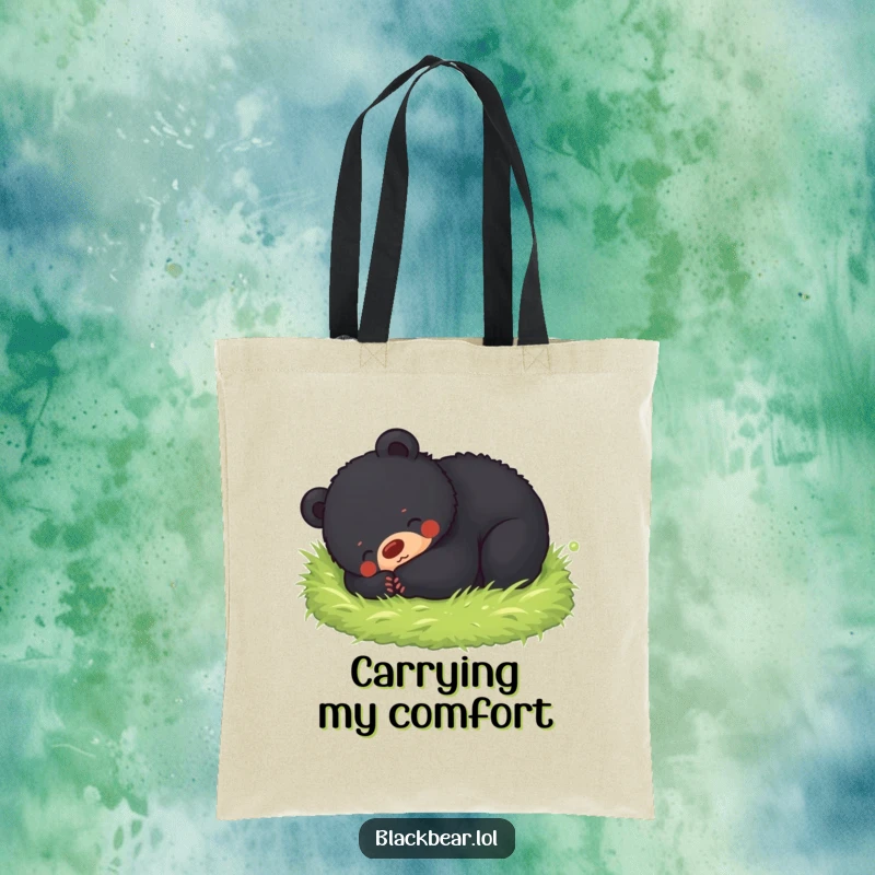 Funny tote bag featuring a black bear cub happily rolling in soft moss, perfect for carrying your treasures with a smile.