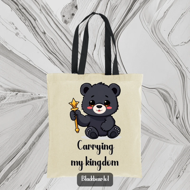 Funny black bear cub tote bag holding a shiny scepter with a paw, perfect for royal errands.