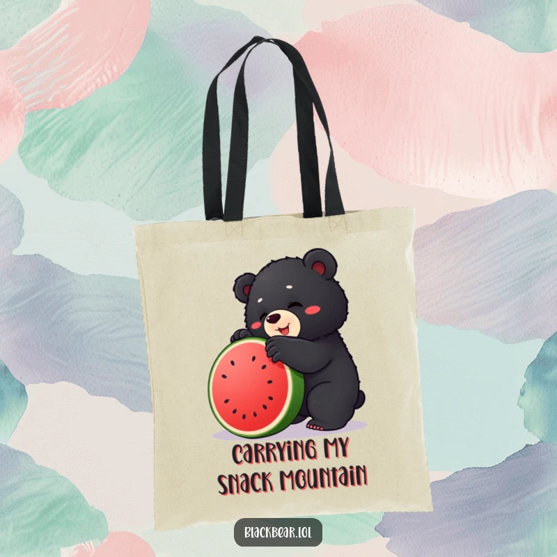 Funny tote bag featuring a chubby black bear cub comically trying to climb its way up a watermelon.