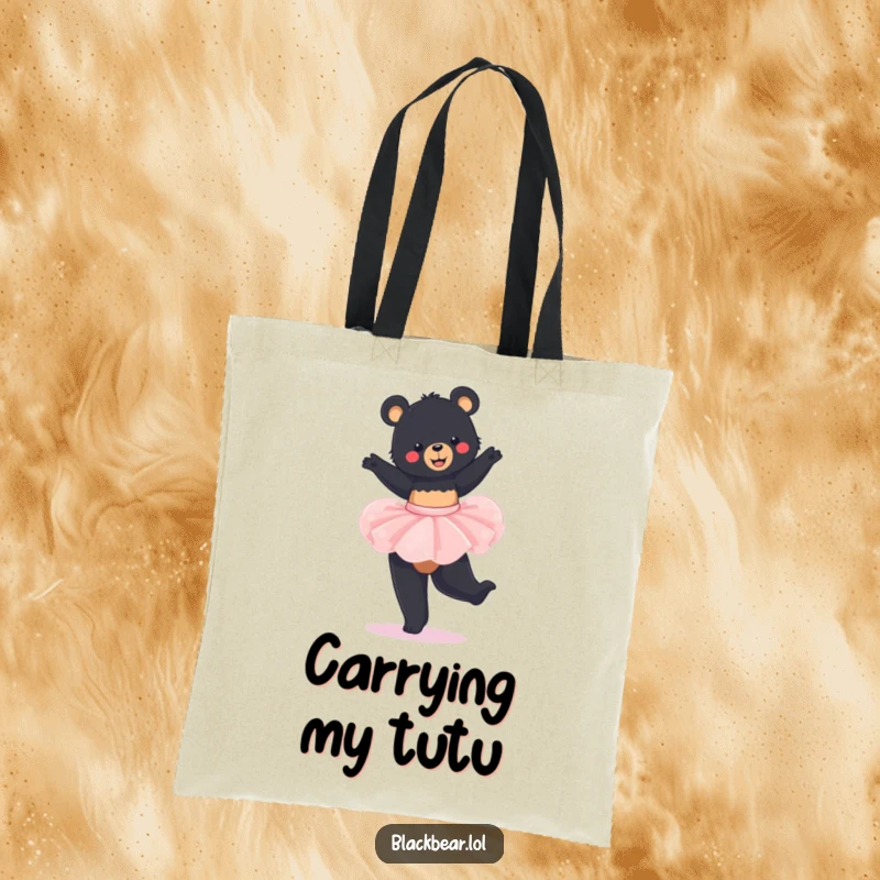 Funny Tote Bag: Cute black bear cub dancing in a tutu, showcasing a delightful and energetic twirl.