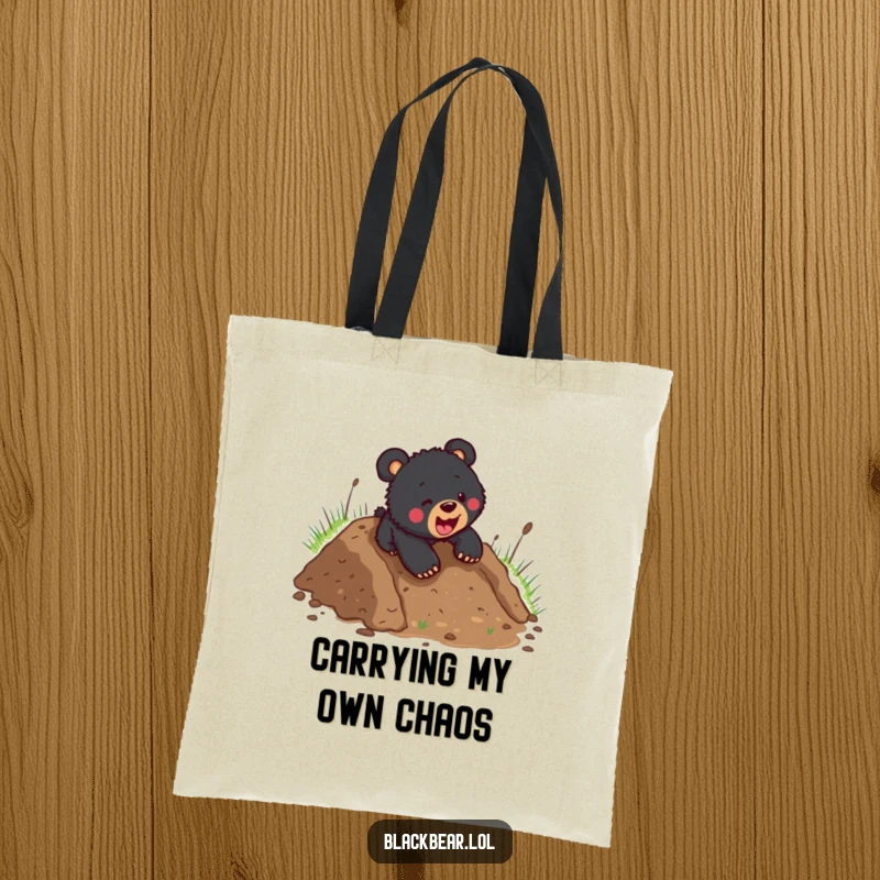 Funny black bear cub mid-slide down a muddy embankment, determined and playful, perfect for carrying groceries with humor.