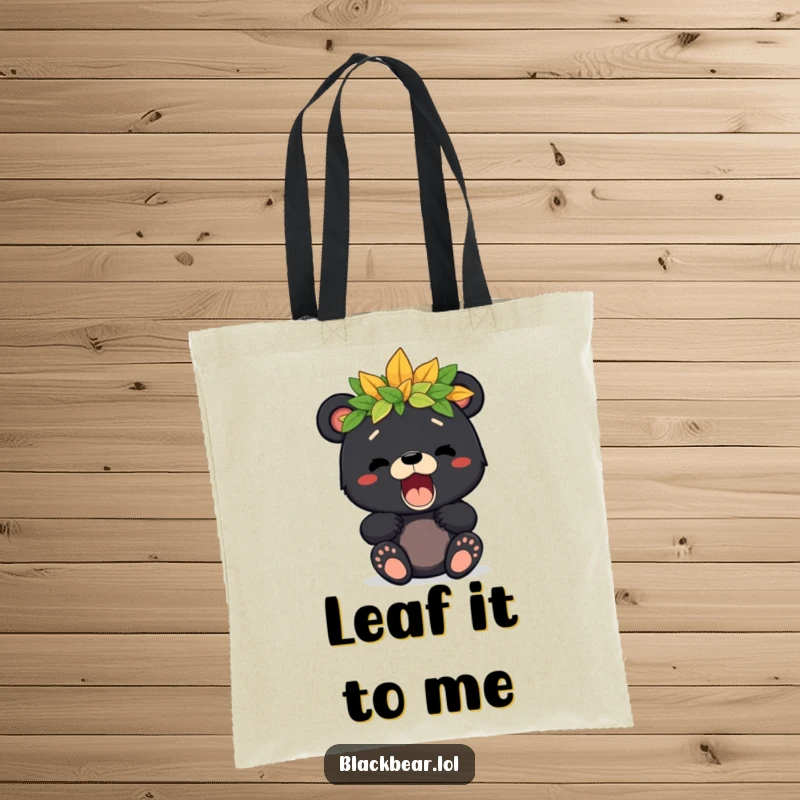 Cute tote bag featuring a black bear cub with a leaf crown giving a playful roar, perfect for carrying kids' essentials.